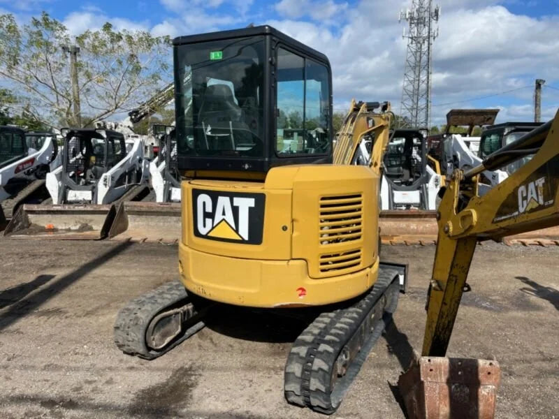 Miniexcavadora Caterpillar 303.5ECR 3,5 t usada 2015 cabina con aire acondicionado con 3 cucharas