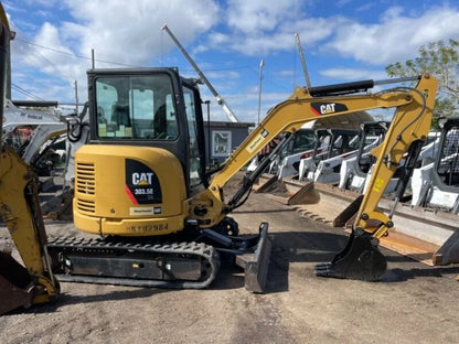 Miniexcavadora Caterpillar 303.5ECR 3,5 t usada 2015 cabina con aire acondicionado con 3 cucharas