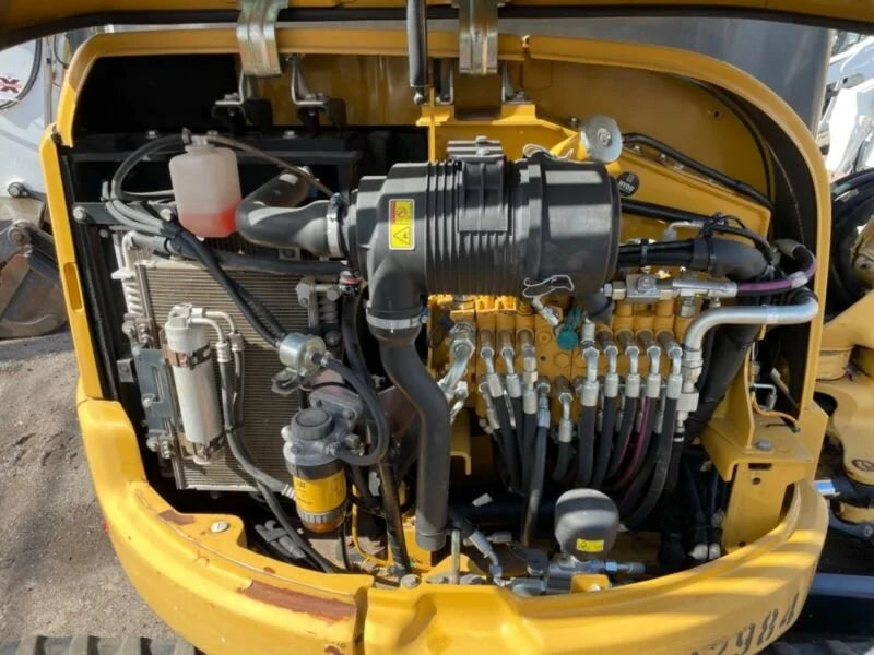 Miniexcavadora Caterpillar 303.5ECR 3,5 t usada 2015 cabina con aire acondicionado con 3 cucharas