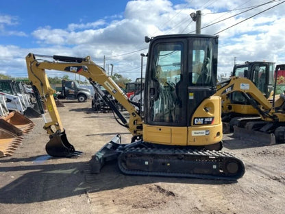 Miniexcavadora Caterpillar 303.5ECR 3,5 t usada 2015 cabina con aire acondicionado con 3 cucharas