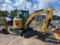 Miniexcavadora Caterpillar 303.5ECR 3,5 t usada 2015 cabina con aire acondicionado con 3 cucharas