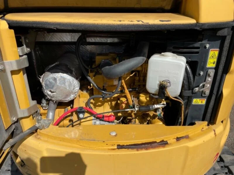 Miniexcavadora Caterpillar 303.5ECR 3,5 t usada 2015 cabina con aire acondicionado con 3 cucharas