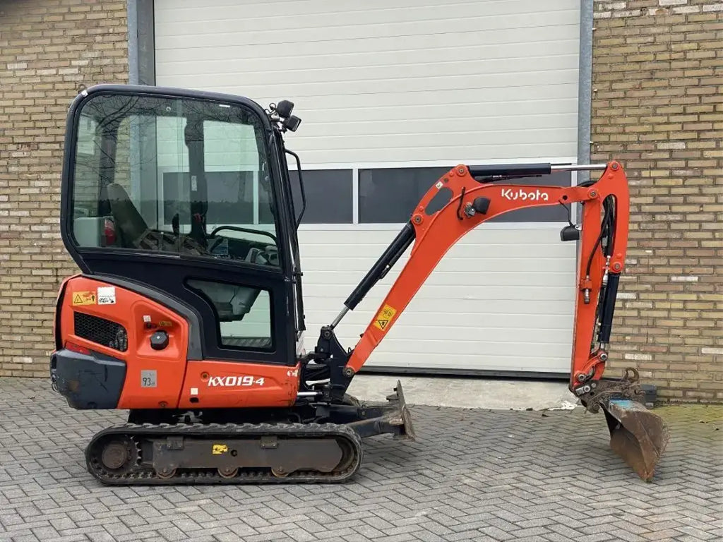 Kubota KX019-4 (2012) – Miniexcavadora 1,8T – 8 386 h – 3 Cucharas – Lista para usar