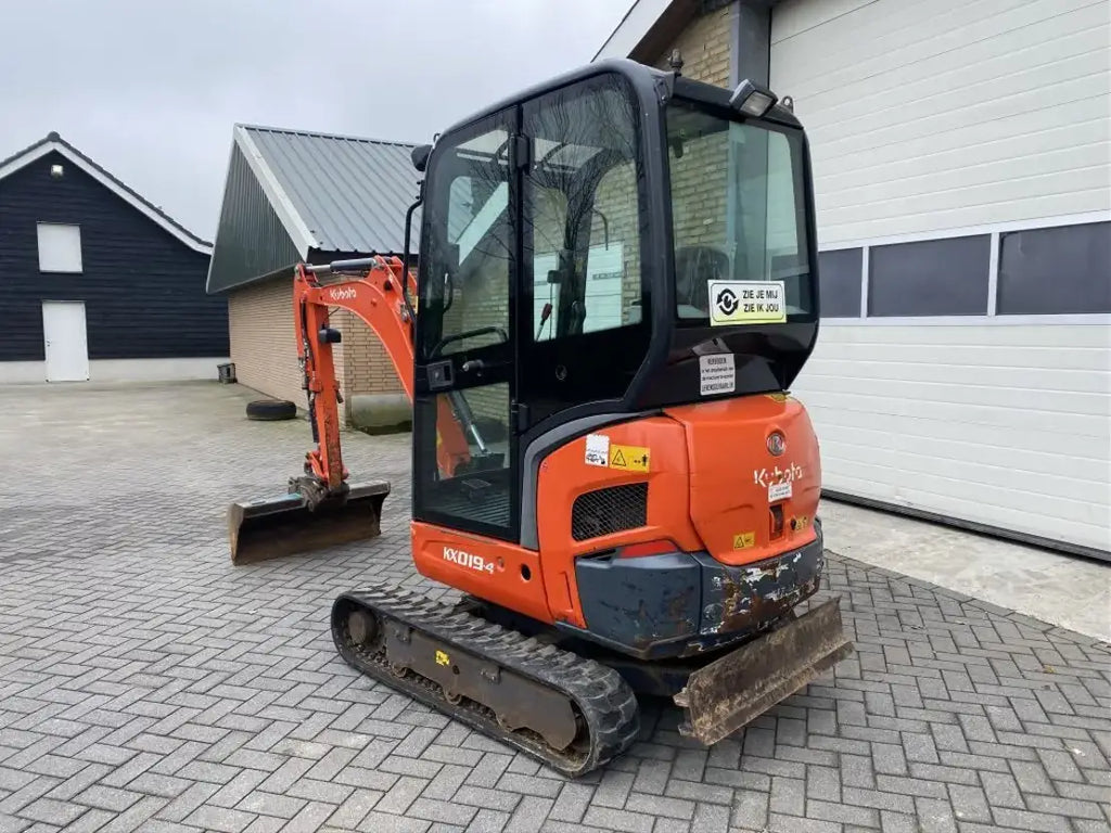 Kubota KX019-4 (2012) – Miniexcavadora 1,8T – 8 386 h – 3 Cucharas – Lista para usar