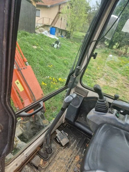 Miniexcavadora Kubota U25-3 de 2,5 t usada 2003 cabina cerrada de 3050 h con 3 cucharones