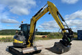Miniexcavadora usada New Holland E50B SR (2012) – 5,1T + Remolque