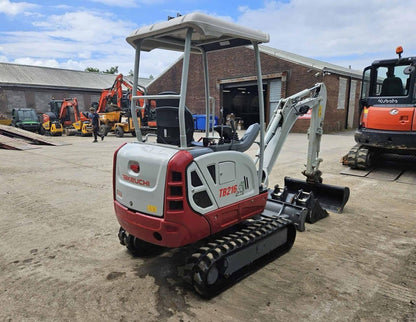 Miniexcavadora compacta Takeuchi TB216 de 1,7 t usada 2022 con 82 h y 3 cucharones