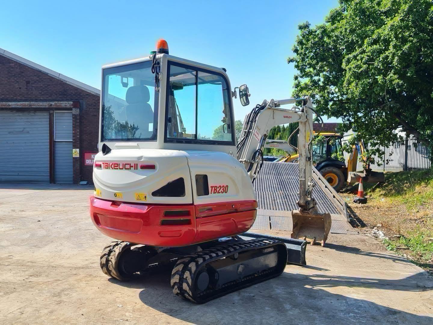 Miniexcavadora Takeuchi TB230 de 2,8 t de ocasión 2016 con 1769 h y enganche rápido