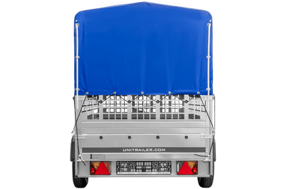 Remolque de transporte de coches sobre muelles 264x125 UNITRAILER GARDEN 264/R BASCULANTE con paredes de rejilla, marco H-800 y lona azul