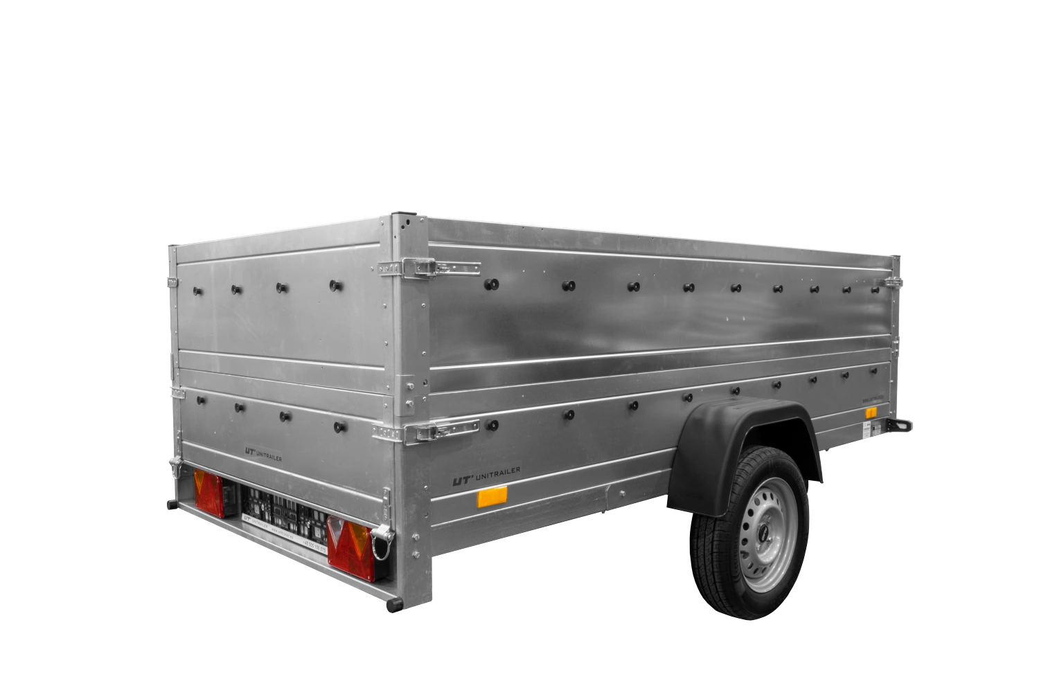 Remolque de un eje con suspensión 264x125 UNITRAILER GARDEN 264/R BASCULANTE con laterales BIS, marco H-0 y lona gris